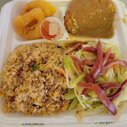 Combination plate with pork chow mein, pork fried rice, egg foo young and fried shrimp