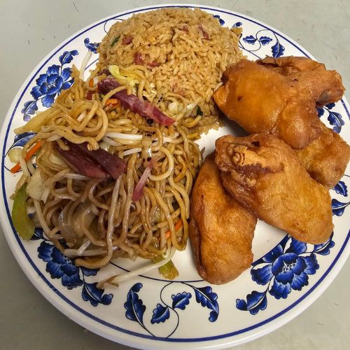 Sweet and sour chicken wing dinner with pork chow mein and pork fried rice